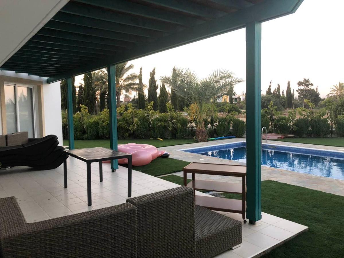 Oasi Rejuve Poseidon Villa Meneou Bagian luar foto